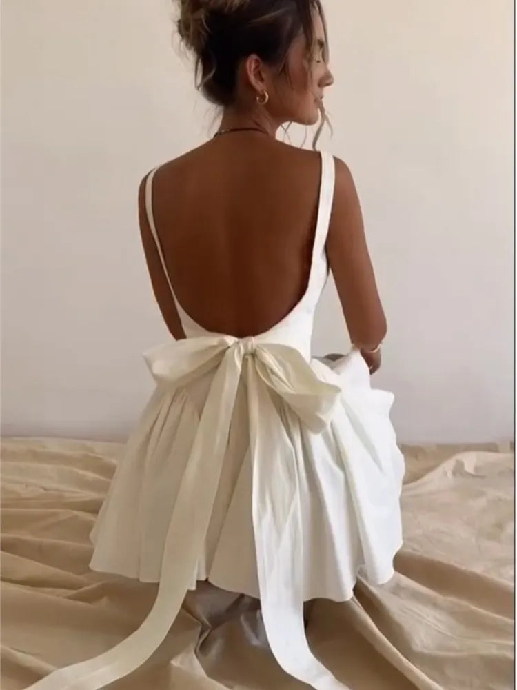 Elegant Backless Bow Lace Up Mini Dress Women Sweet Square Neck Pleated Suspender A-line Dresses Summer Lady Solid Robe Chic Sleeveless Mini Dress Elegant Backless Bow Lace Up Mini Dress Women Sweet Square Neck Pleated Suspender A-line Dresses Summer Lady Solid Robe Chic Sleeveless Mini Dress